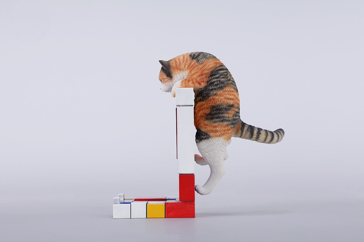 A 1/6 scale Mondrian wall-climbing cat figurine crafted from high-quality resin, featuring a playful cat climbing a colorful cubist-style wall, offering a unique and stylish addition to any home decor.