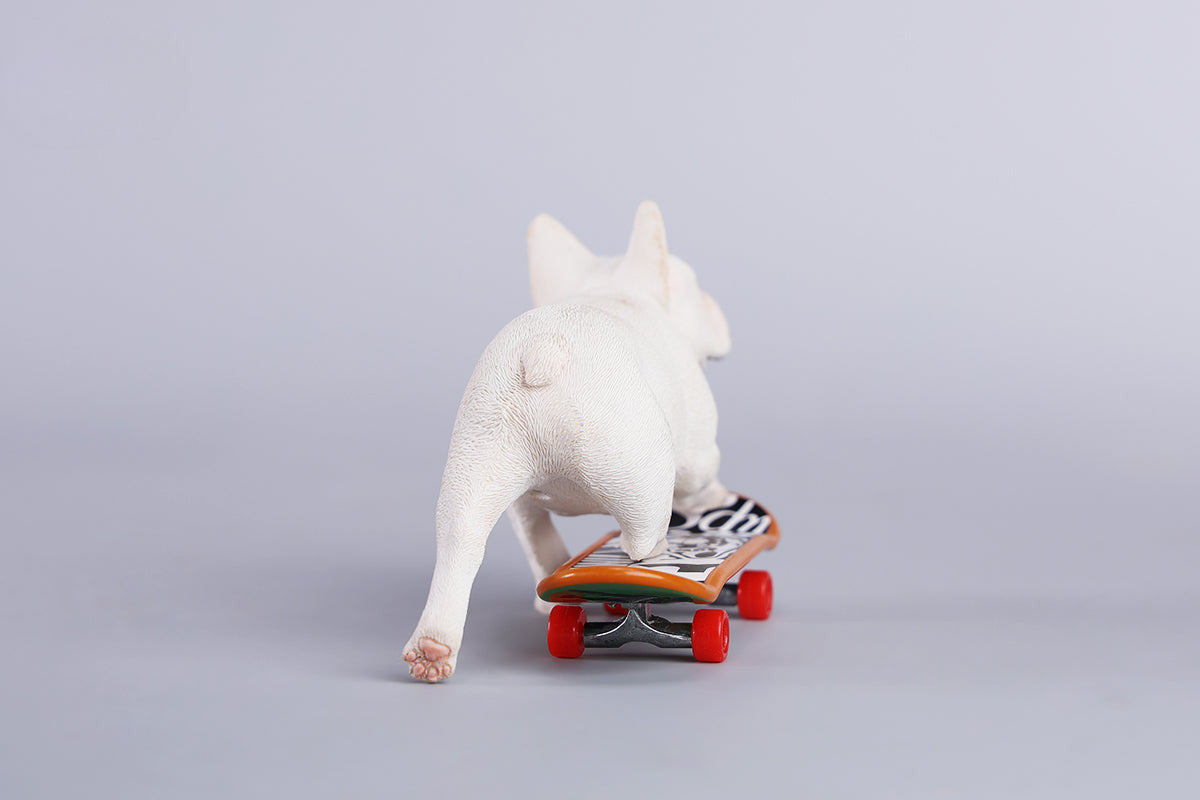 A detailed 1/6 scale figurine of a French Bulldog riding a skateboard, showcasing lifelike texture and joyful expression. Perfect for dog lovers and collectors.