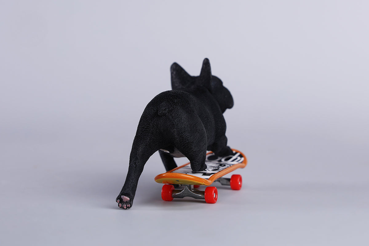 A detailed 1/6 scale figurine of a French Bulldog riding a skateboard, showcasing lifelike texture and joyful expression. Perfect for dog lovers and collectors.