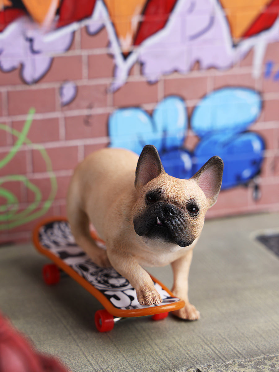 A detailed 1/6 scale figurine of a French Bulldog riding a skateboard, showcasing lifelike texture and joyful expression. Perfect for dog lovers and collectors.