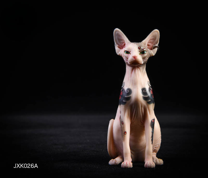 A set of 1/6 scale Sphinx Hairless Cat resin models featuring detailed tattoo designs and realistic facial expressions. The collection showcases the unique, sleek look of hairless cats, with a focus on their skin texture and distinct body contours. The figures are posed in both sitting and stretching positions, emphasizing their graceful and elegant nature.