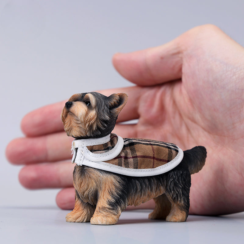 Two highly detailed 1/6 scale Yorkshire dog models dressed in stylish plaid coats. These realistic figurines capture the charming appearance of Yorkshire Terriers, making them perfect for collectors and dog lovers.