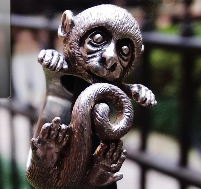 Sterling silver Baby Monkey Ring in two finishes: classic silver and antique black. Handcrafted, custom engravable, and made from high-quality 925 silver with intricate detailing.