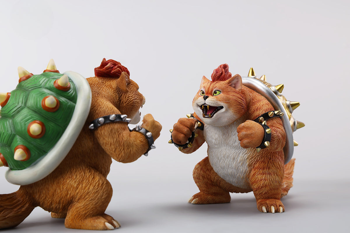 A Bowser Cat figurine with a removable magnetic head and a pipe accessory. The cat has a spiked shell on its back, designed for collectors and fans of unique action figures. The figurine combines feline charm with Bowser's iconic style, making it an ideal collectible piece.