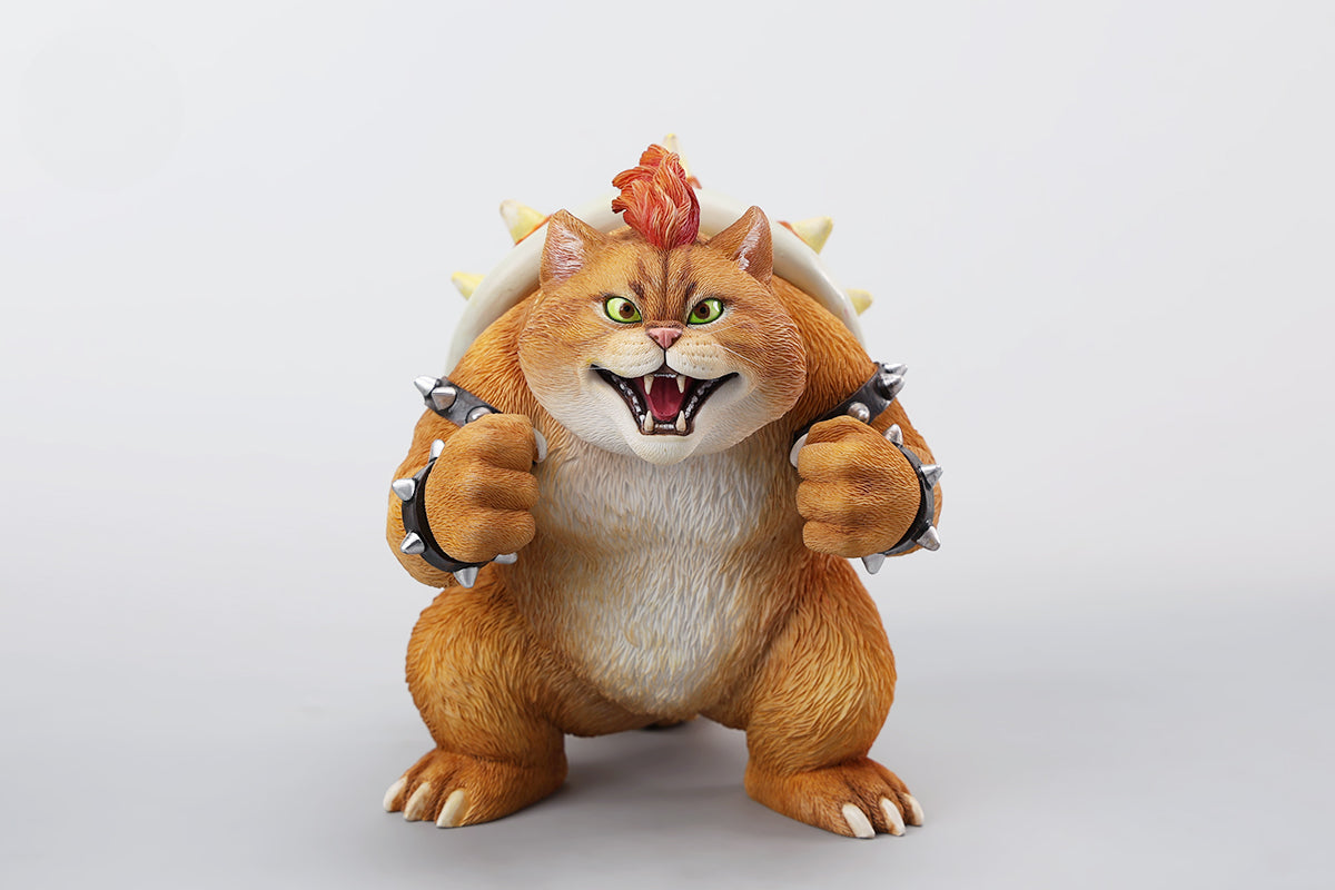 A Bowser Cat figurine with a removable magnetic head and a pipe accessory. The cat has a spiked shell on its back, designed for collectors and fans of unique action figures. The figurine combines feline charm with Bowser's iconic style, making it an ideal collectible piece.