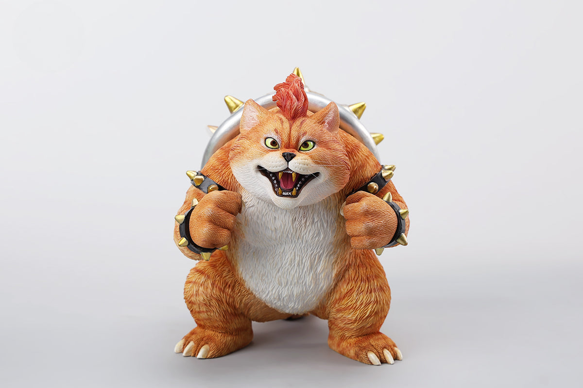 A Bowser Cat figurine with a removable magnetic head and a pipe accessory. The cat has a spiked shell on its back, designed for collectors and fans of unique action figures. The figurine combines feline charm with Bowser's iconic style, making it an ideal collectible piece.