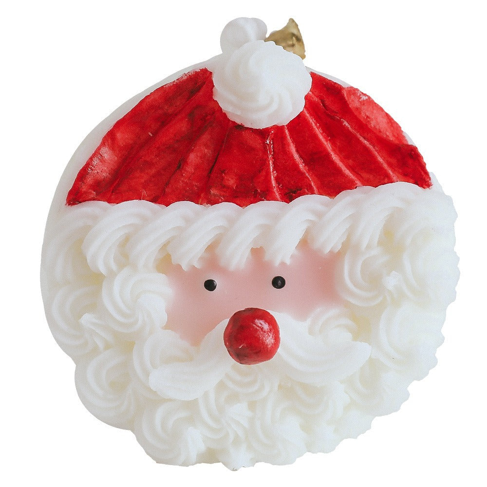 Handmade Cake Santa Scented Candle, featuring a festive Santa Claus design. Made from paraffin and soy wax, perfect for holiday decor or gifting. Burns for 4-6 hours, spreading warmth and joy during Christmas celebrations.