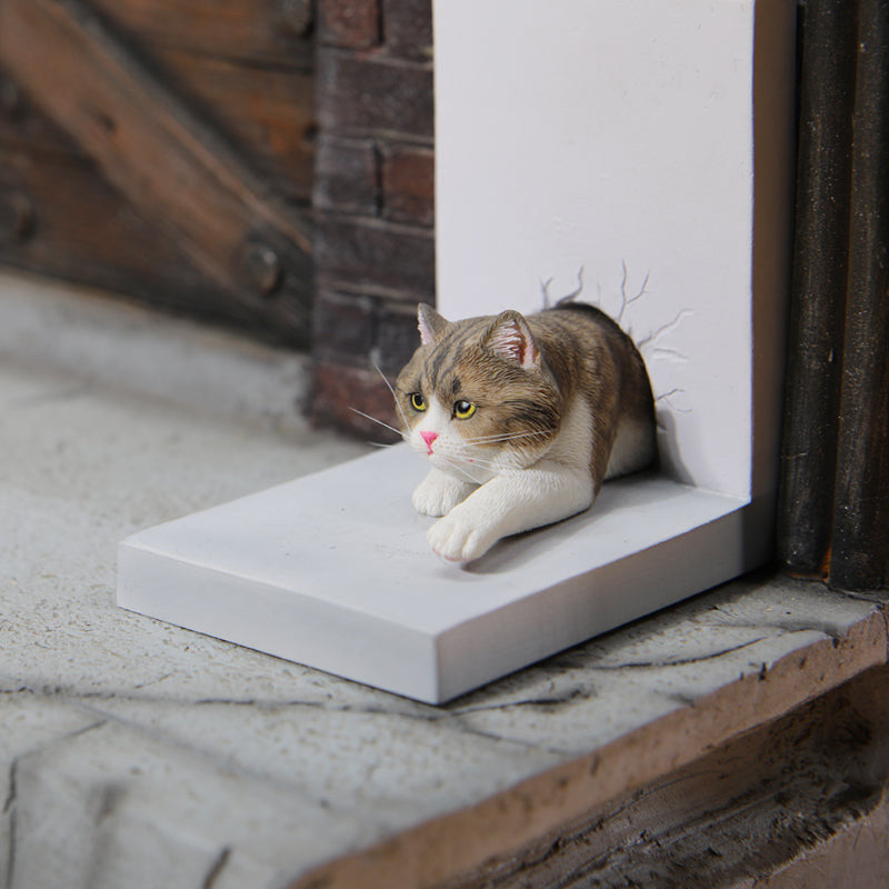 A series of 1/6 scale cat figurines designed to appear as though they are crawling through walls. Each model features different colored cats—black, white, orange, and calico—emerging through a wall, capturing a playful and curious moment.