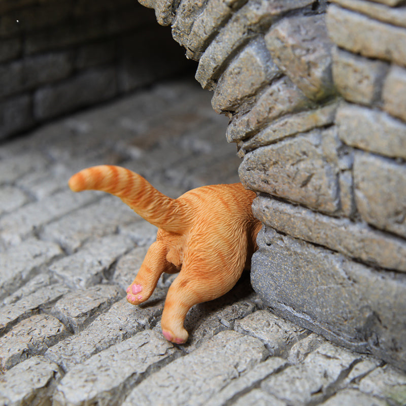 A series of 1/6 scale cat figurines designed to appear as though they are crawling through walls. Each model features different colored cats—black, white, orange, and calico—emerging through a wall, capturing a playful and curious moment.