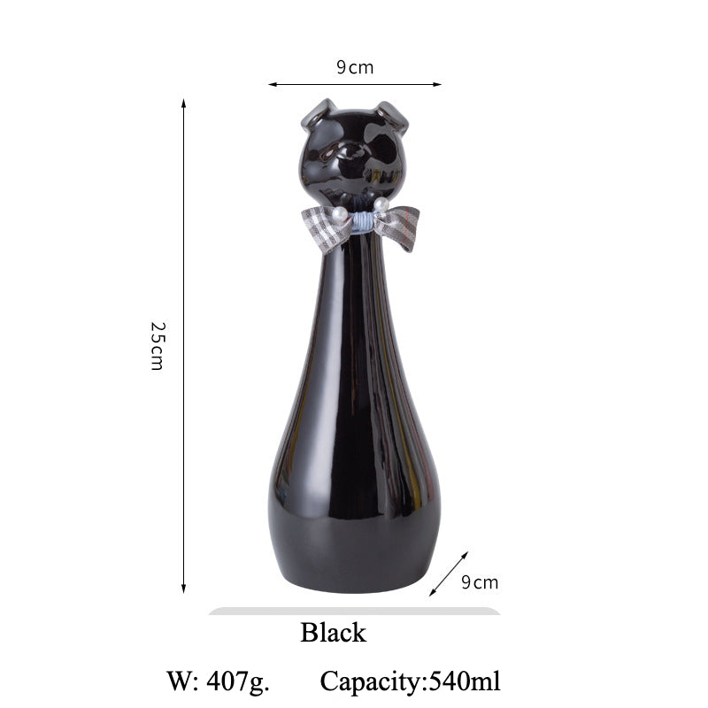 Yellow ceramic cat-shaped pet cremation urn with a glossy finish, featuring a stylish cat figure with a bow tie on a slender base, ideal for North American pet owners. This handcrafted urn provides secure ashes storage, perfect for home memorial display on mantels or shelves, with a vibrant yellow hue and elegant design.