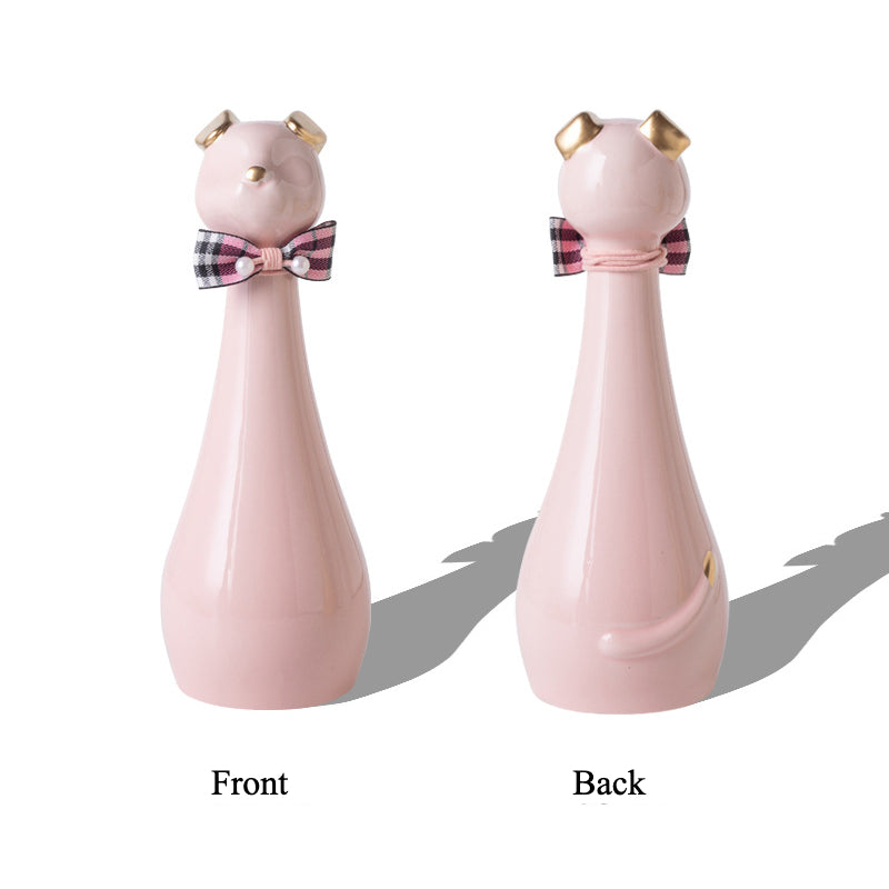 Yellow ceramic cat-shaped pet cremation urn with a glossy finish, featuring a stylish cat figure with a bow tie on a slender base, ideal for North American pet owners. This handcrafted urn provides secure ashes storage, perfect for home memorial display on mantels or shelves, with a vibrant yellow hue and elegant design.