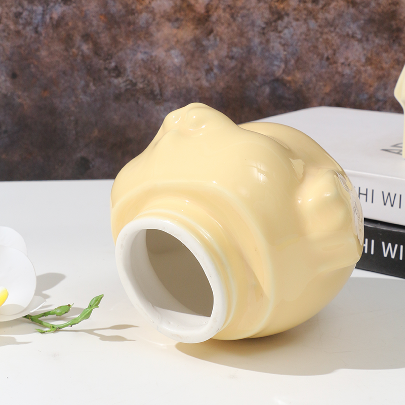 Orange ceramic dog-shaped pet urn with a glossy finish, featuring a cute dog figure on a square base, ideal for North American pet owners. This handcrafted memorial urn securely stores pet ashes, perfect for home display on mantels or shelves, offering a dignified tribute with its vibrant color and unique design.