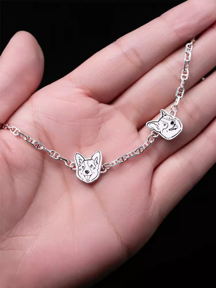 A beautifully handcrafted 925 silver bracelet featuring a custom cat portrait charm, designed to memorialize a beloved pet. The bracelet showcases intricate detailing that captures the likeness of the pet, making it a unique and personalized accessory for pet lovers. Perfect as a pet memorial keepsake or a special gift.






