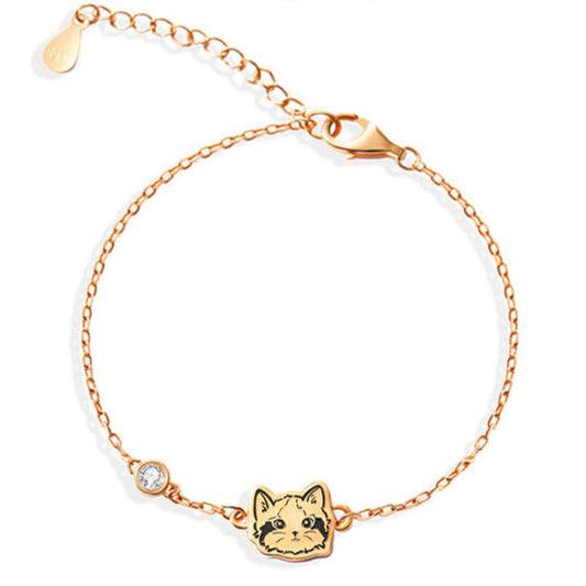 Close-up image of a Custom Pet Portrait Bracelet in S925 silver featuring a detailed charm of a pet's face. The bracelet includes a synthetic zircon stone accent, showcasing elegant craftsmanship. Perfect for pet lovers, this personalized bracelet is custom-made based on photos provided, capturing the unique likeness of a beloved pet. Handcrafted with care, it serves as a lasting tribute or memorial keepsake, emphasizing high-quality materials and attention to detail. Ideal for those seeking a unique and me