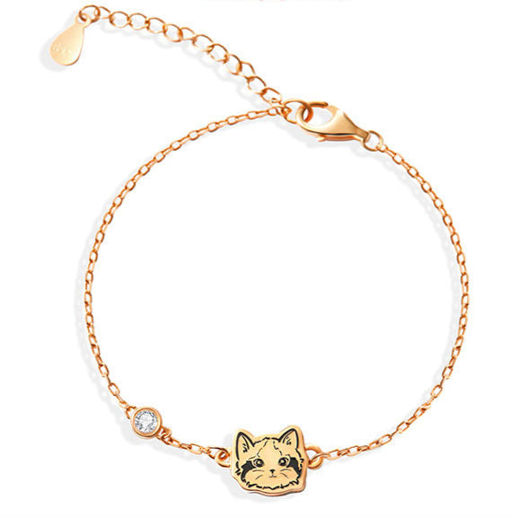 Close-up image of a Custom Pet Portrait Bracelet in S925 silver featuring a detailed charm of a pet's face. The bracelet includes a synthetic zircon stone accent, showcasing elegant craftsmanship. Perfect for pet lovers, this personalized bracelet is custom-made based on photos provided, capturing the unique likeness of a beloved pet. Handcrafted with care, it serves as a lasting tribute or memorial keepsake, emphasizing high-quality materials and attention to detail. Ideal for those seeking a unique and me