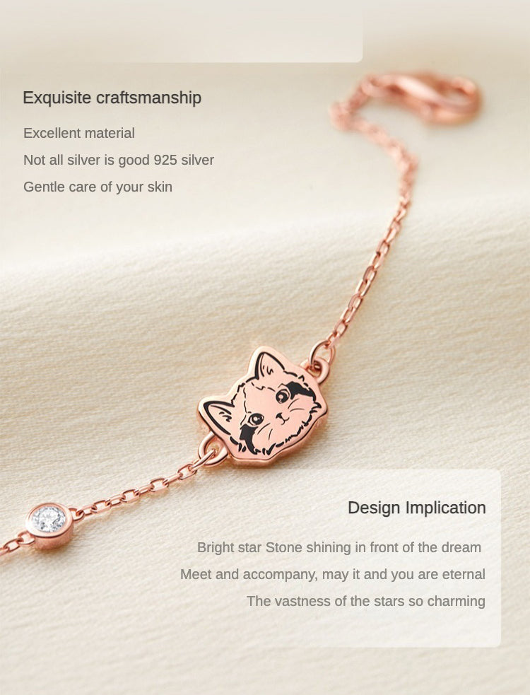 Close-up image of a Custom Pet Portrait Bracelet in S925 silver featuring a detailed charm of a pet's face. The bracelet includes a synthetic zircon stone accent, showcasing elegant craftsmanship. Perfect for pet lovers, this personalized bracelet is custom-made based on photos provided, capturing the unique likeness of a beloved pet. Handcrafted with care, it serves as a lasting tribute or memorial keepsake, emphasizing high-quality materials and attention to detail. Ideal for those seeking a unique and me