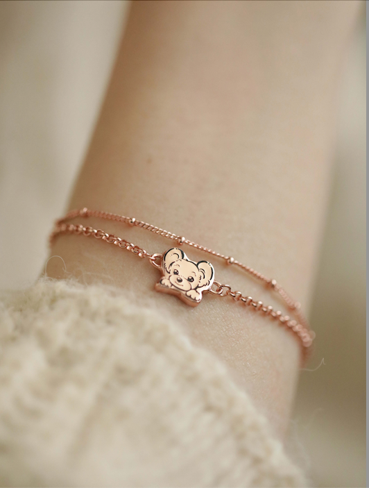 Custom Pet Portrait Bracelet featuring a double-chain design in S925 silver, with a personalized engraving of a pet's face based on a provided photo. This handmade bracelet captures the unique likeness of your pet, creating a meaningful keepsake for pet owners, available in silver, gold, or rose gold finishes. Ideal as a pet memorial gift or a personal memento.

