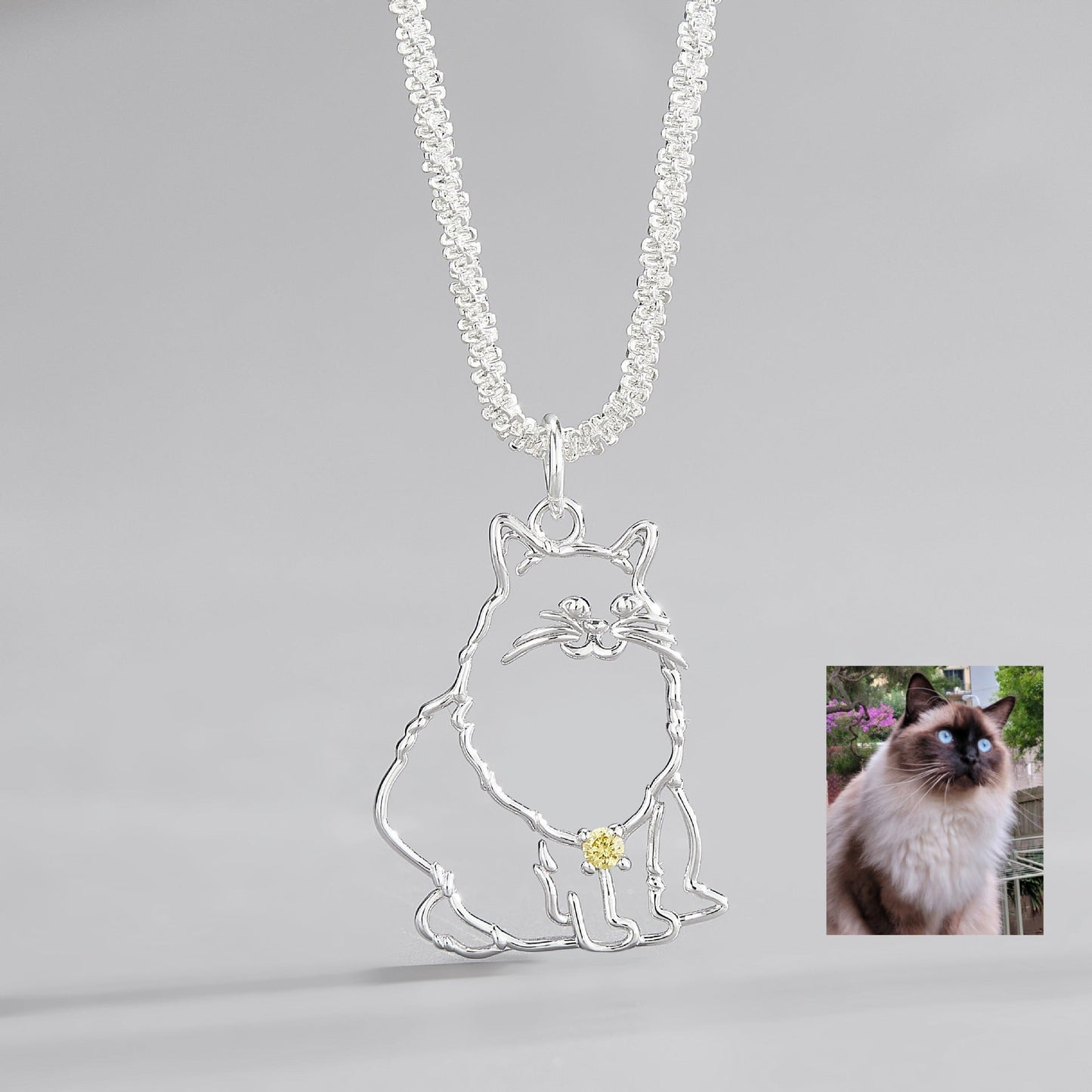 Custom Pet Portrait Necklace featuring a 925 silver pendant designed from a pet's photo, showcasing a unique and personalized outline of the pet in silver with a detailed design, available in both silver and gold finishes, ideal as a pet keepsake or memorial gift.