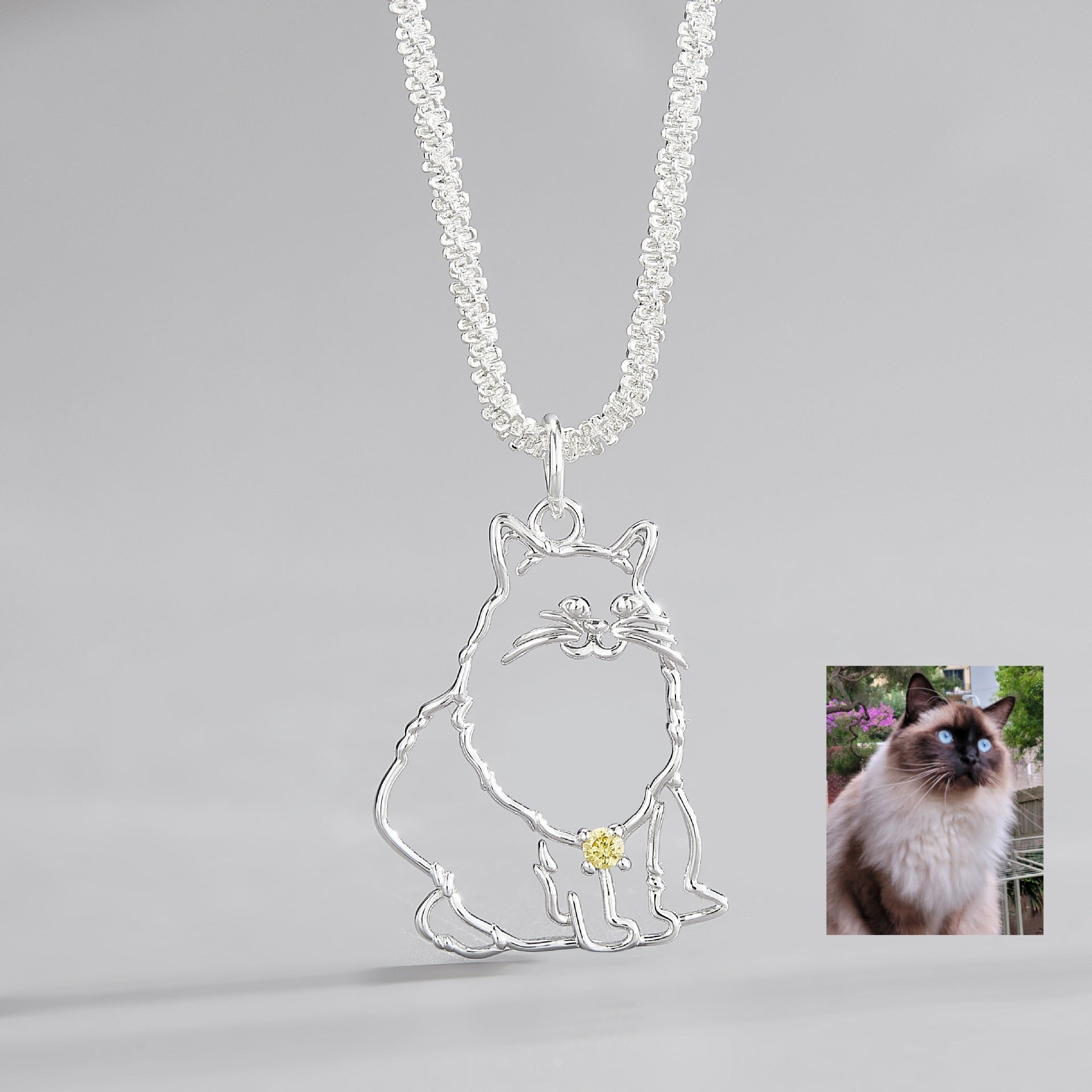 Custom Pet Portrait Necklace featuring a 925 silver pendant designed from a pet's photo, showcasing a unique and personalized outline of the pet in silver with a detailed design, available in both silver and gold finishes, ideal as a pet keepsake or memorial gift.