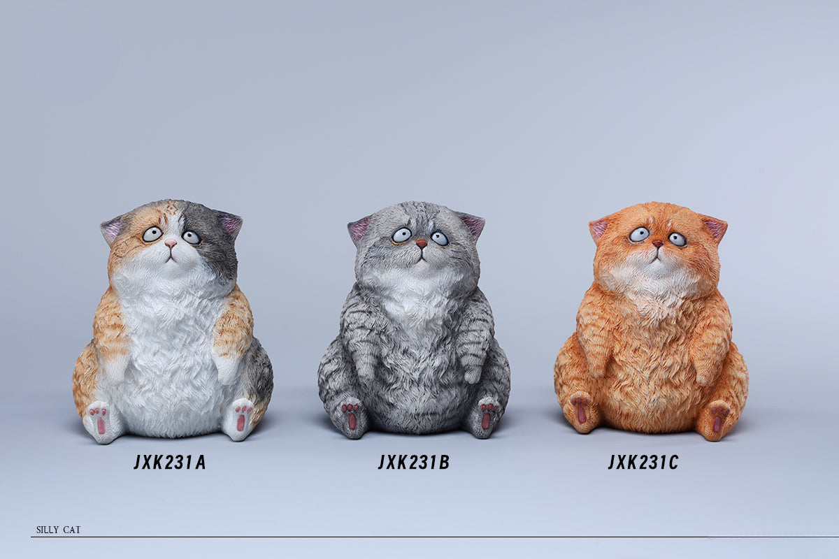 A set of three adorable Dazed Cat Model Ornaments featuring lifelike details and a cute, dazed expression. The models come in three colors: calico, gray, and orange. Each cat is depicted in a seated position, showcasing intricate fur textures and expressive eyes. Perfect for cat lovers and collectors.