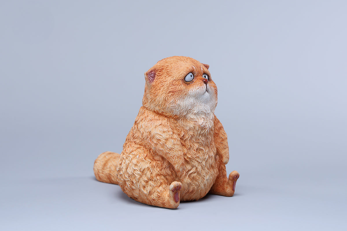 A set of three adorable Dazed Cat Model Ornaments featuring lifelike details and a cute, dazed expression. The models come in three colors: calico, gray, and orange. Each cat is depicted in a seated position, showcasing intricate fur textures and expressive eyes. Perfect for cat lovers and collectors.