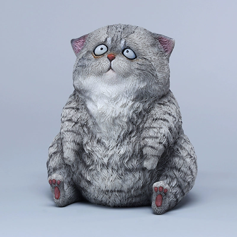 A set of three adorable Dazed Cat Model Ornaments featuring lifelike details and a cute, dazed expression. The models come in three colors: calico, gray, and orange. Each cat is depicted in a seated position, showcasing intricate fur textures and expressive eyes. Perfect for cat lovers and collectors.