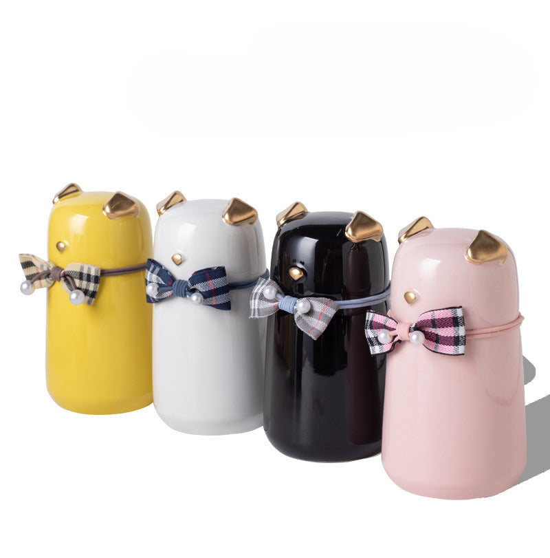 White ceramic simple pet cremation urn with a glossy, moisture-resistant finish, featuring a round shape and smooth texture, ideal for North American pet owners. This handcrafted urn provides secure ashes storage, perfect for home memorial display on mantels or shelves, with a clean white design for a dignified tribute.