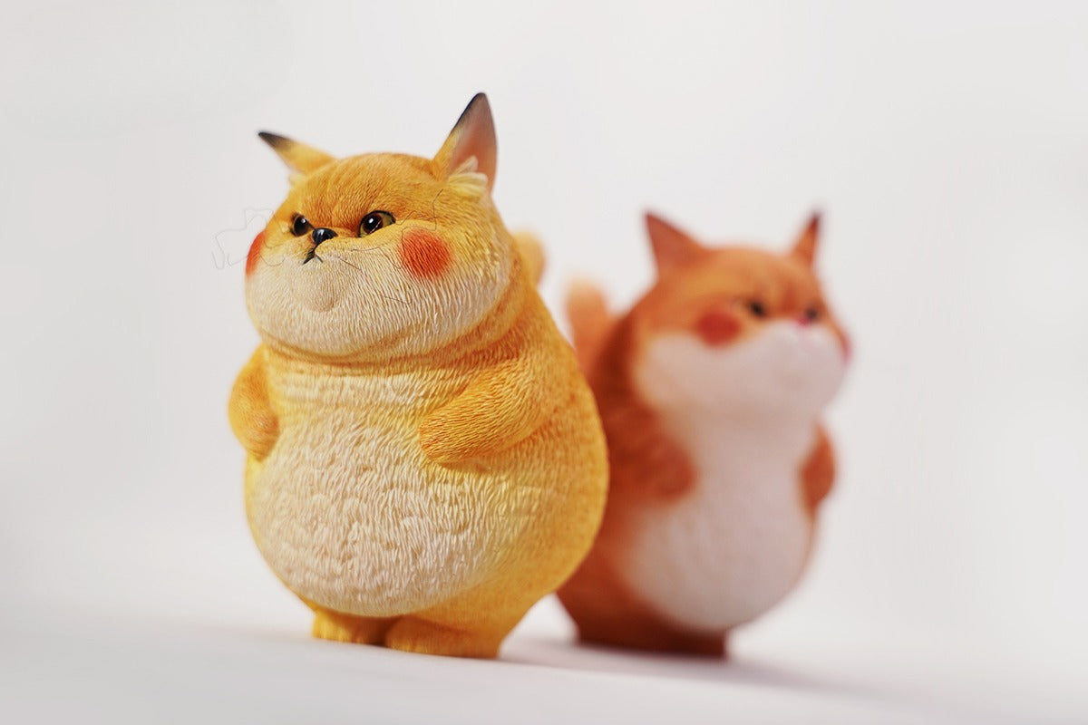 This ElectroCat Charging Station Figurine features a cute cat with a charging pump made from high-quality vinyl. The charging platform adds functionality, allowing the figurine to light up, making it a unique home decor piece and interactive collectible for cat lovers and collectors.