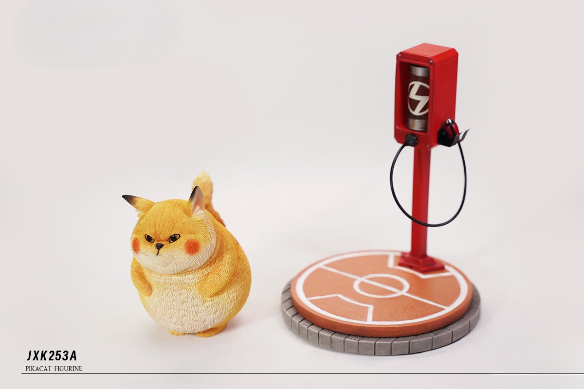 This ElectroCat Charging Station Figurine features a cute cat with a charging pump made from high-quality vinyl. The charging platform adds functionality, allowing the figurine to light up, making it a unique home decor piece and interactive collectible for cat lovers and collectors.