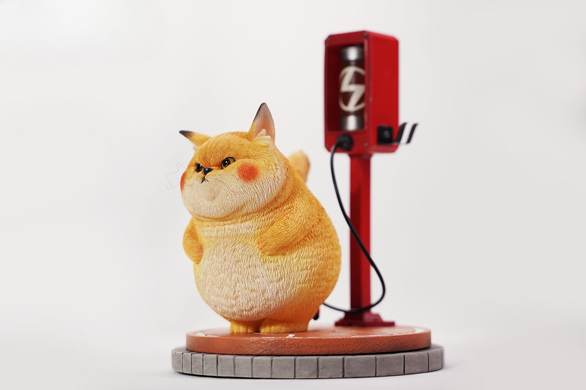 This ElectroCat Charging Station Figurine features a cute cat with a charging pump made from high-quality vinyl. The charging platform adds functionality, allowing the figurine to light up, making it a unique home decor piece and interactive collectible for cat lovers and collectors.