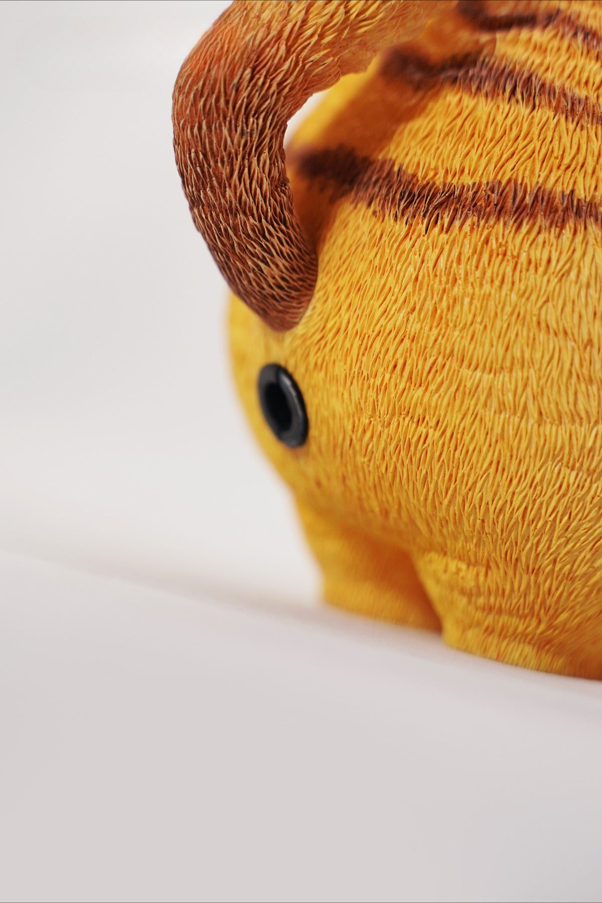 This ElectroCat Charging Station Figurine features a cute cat with a charging pump made from high-quality vinyl. The charging platform adds functionality, allowing the figurine to light up, making it a unique home decor piece and interactive collectible for cat lovers and collectors.