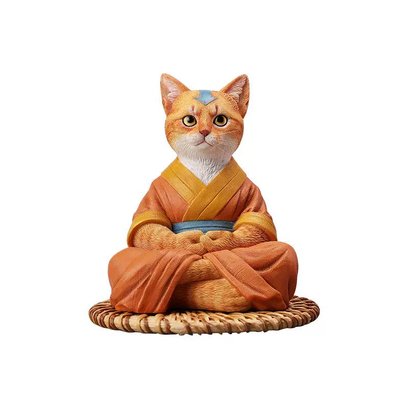 A handcrafted Airbender Cat Figurine in a meditative pose, dressed in an orange robe with a blue sash, sitting on a rattan-weaved cushion. This finely detailed resin sculpture captures the tranquility of mindfulness, perfect for cat lovers and meditation enthusiasts. An ideal collectible and decorative accent for any serene space.