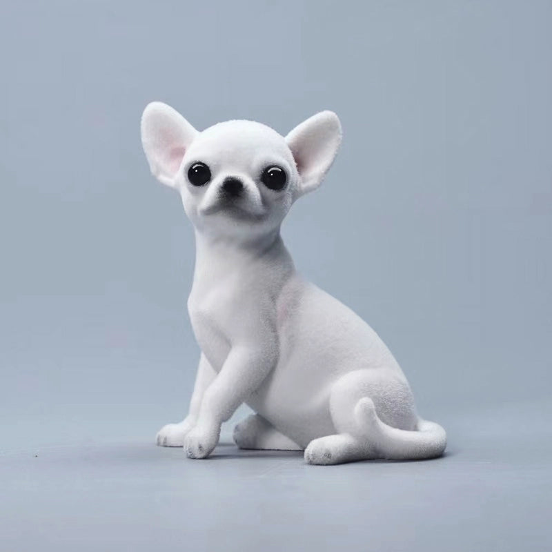 1/6 scale Chihuahua simulation animal models featuring realistic and detailed representations of the Chihuahua breed. These figurines showcase the distinct features of Chihuahuas, including their expressive eyes and alert ears. Available in various colors, these models are perfect for collectors and dog enthusiasts, adding a charming touch to any decor.