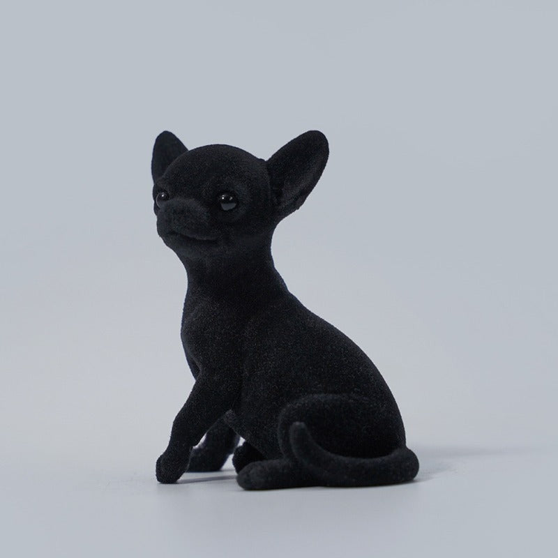 1/6 scale Chihuahua simulation animal models featuring realistic and detailed representations of the Chihuahua breed. These figurines showcase the distinct features of Chihuahuas, including their expressive eyes and alert ears. Available in various colors, these models are perfect for collectors and dog enthusiasts, adding a charming touch to any decor.