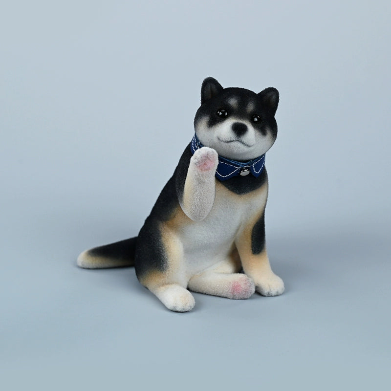 A set of three flocking Shiba Inu dog models in different colors - black, white, and tan. Each model features a realistic and adorable design with a collar in different colors: blue, yellow, and red. The dogs are shown in various poses, including waving, standing, and sitting.