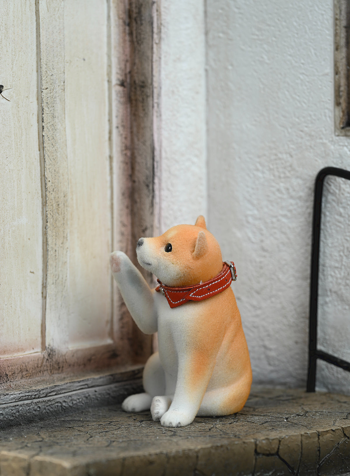 A set of three flocking Shiba Inu dog models in different colors - black, white, and tan. Each model features a realistic and adorable design with a collar in different colors: blue, yellow, and red. The dogs are shown in various poses, including waving, standing, and sitting.