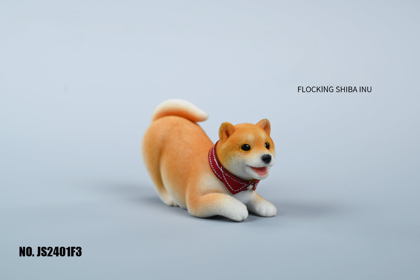 A set of three flocking Shiba Inu dog models in different colors - black, white, and tan. Each model features a realistic and adorable design with a collar in different colors: blue, yellow, and red. The dogs are shown in various poses, including waving, standing, and sitting.