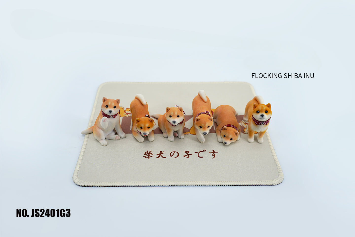 A set of three flocking Shiba Inu dog models in different colors - black, white, and tan. Each model features a realistic and adorable design with a collar in different colors: blue, yellow, and red. The dogs are shown in various poses, including waving, standing, and sitting.