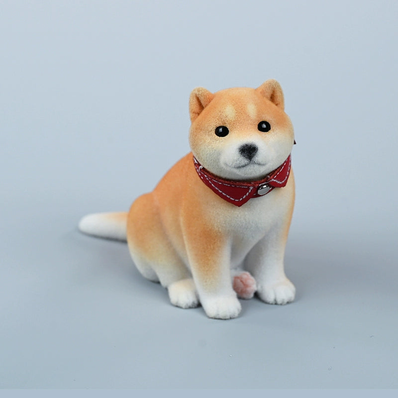 A set of three flocking Shiba Inu dog models in different colors - black, white, and tan. Each model features a realistic and adorable design with a collar in different colors: blue, yellow, and red. The dogs are shown in various poses, including waving, standing, and sitting.