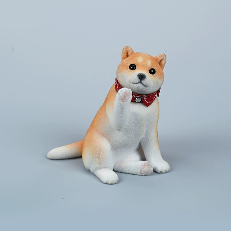 A set of three flocking Shiba Inu dog models in different colors - black, white, and tan. Each model features a realistic and adorable design with a collar in different colors: blue, yellow, and red. The dogs are shown in various poses, including waving, standing, and sitting.