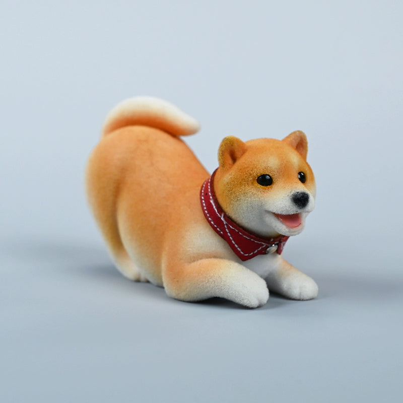 A set of three flocking Shiba Inu dog models in different colors - black, white, and tan. Each model features a realistic and adorable design with a collar in different colors: blue, yellow, and red. The dogs are shown in various poses, including waving, standing, and sitting.