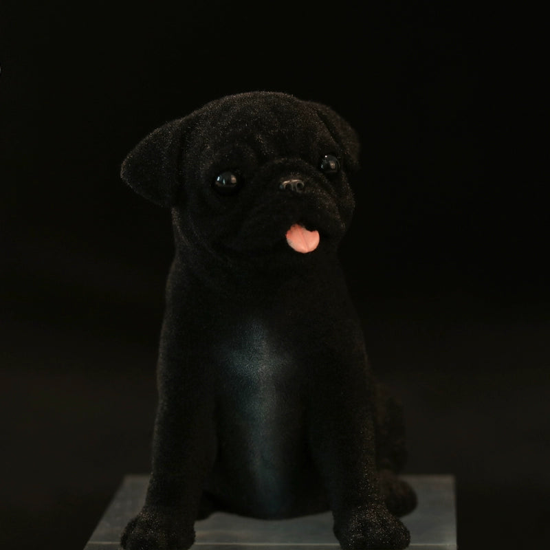 A collection of 1/6 scale Flocking Pug models featuring detailed and realistic representations of pugs in various poses. These figurines showcase the breed's distinctive facial features and playful expressions, with a soft, velvety texture achieved through flocking. Perfect for collectors and dog enthusiasts, these models add a cute and charming touch to any decor.