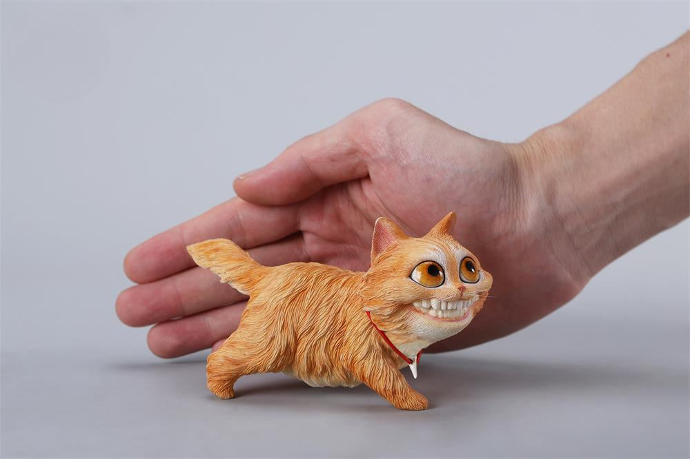 A highly detailed grinning cat resin figurine with expressive eyes, textured fur, and a wide smile. This unique decorative sculpture includes a bone pendant necklace and serves as a quirky, surreal home decor piece or collectible item for cat lovers and fantasy art fans.