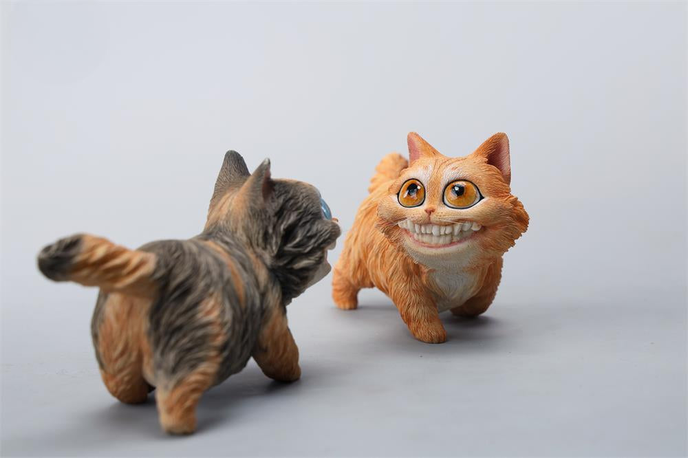A highly detailed grinning cat resin figurine with expressive eyes, textured fur, and a wide smile. This unique decorative sculpture includes a bone pendant necklace and serves as a quirky, surreal home decor piece or collectible item for cat lovers and fantasy art fans.