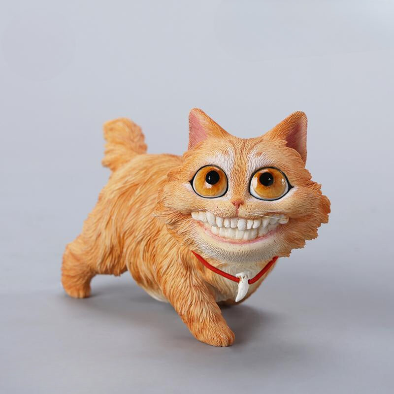 A highly detailed grinning cat resin figurine with expressive eyes, textured fur, and a wide smile. This unique decorative sculpture includes a bone pendant necklace and serves as a quirky, surreal home decor piece or collectible item for cat lovers and fantasy art fans.