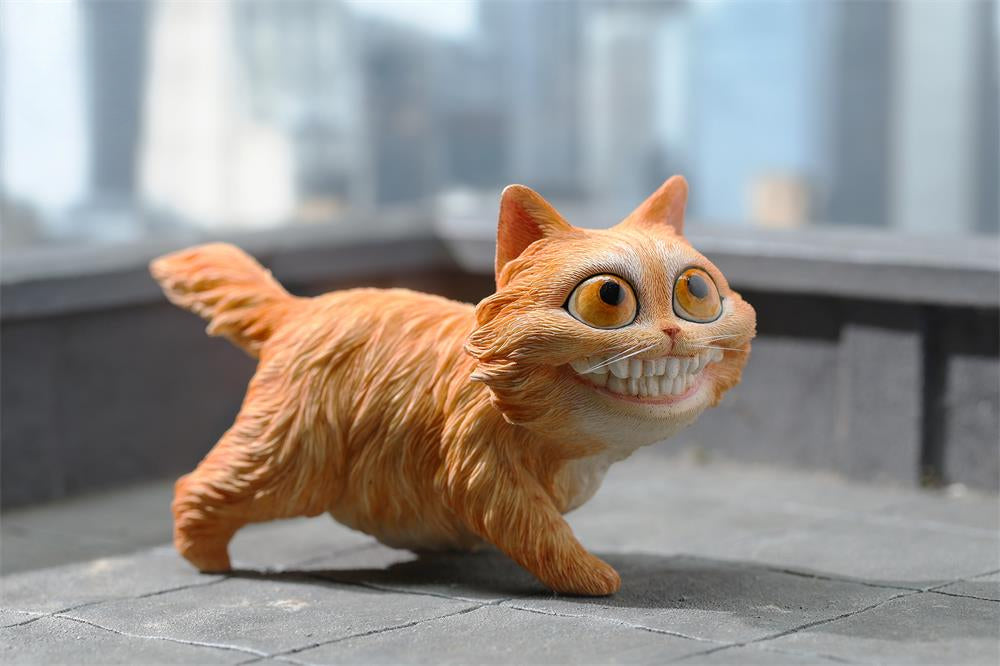 A highly detailed grinning cat resin figurine with expressive eyes, textured fur, and a wide smile. This unique decorative sculpture includes a bone pendant necklace and serves as a quirky, surreal home decor piece or collectible item for cat lovers and fantasy art fans.