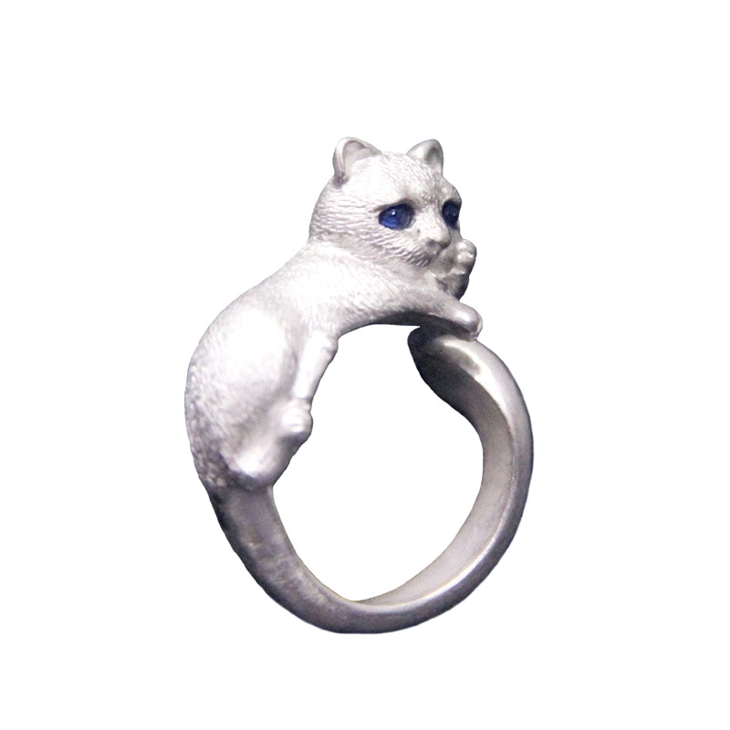 A meticulously handcrafted sterling silver cat ring with customizable gemstone eyes, showcasing the full body of a cat with intricate detailing, perfect for cat lovers and as a personalized tribute to a beloved pet.