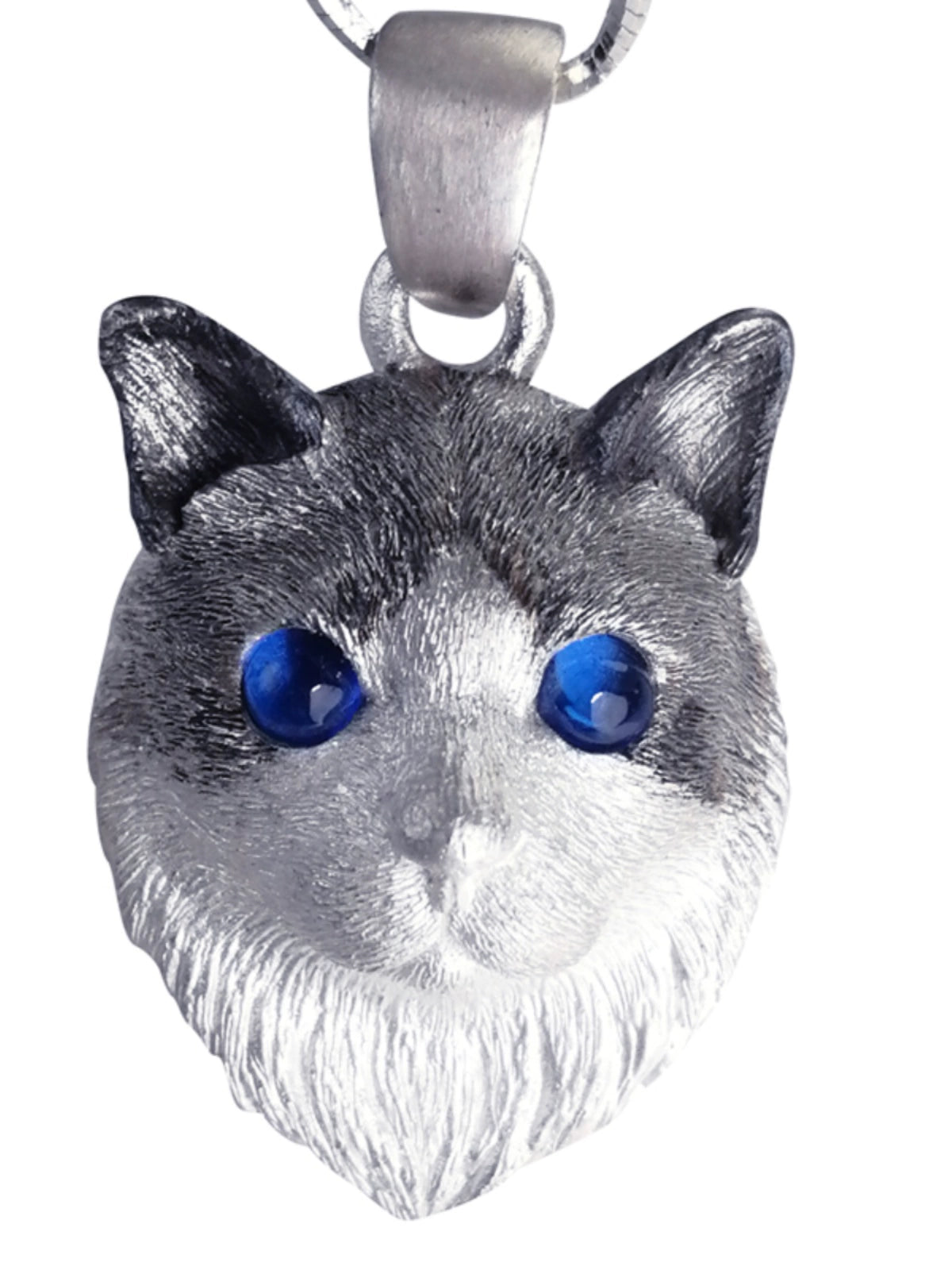 A handcrafted sterling silver cat pendant with customizable gemstone eyes, perfect for pet lovers. This unique piece of jewelry serves as a cherished reminder of your beloved feline friend.