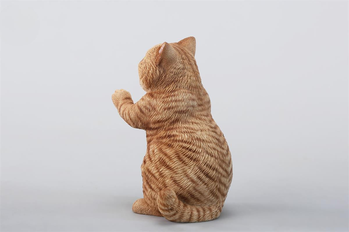 A lifelike string-playing cat figurine crafted from resin, featuring a realistic cat with expressive eyes playing a violin. The sculpture showcases intricate fur details and a beautifully designed musical instrument, making it an excellent collectible or home decor piece for cat lovers and music enthusiasts.