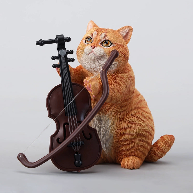 A lifelike string-playing cat figurine crafted from resin, featuring a realistic cat with expressive eyes playing a violin. The sculpture showcases intricate fur details and a beautifully designed musical instrument, making it an excellent collectible or home decor piece for cat lovers and music enthusiasts.